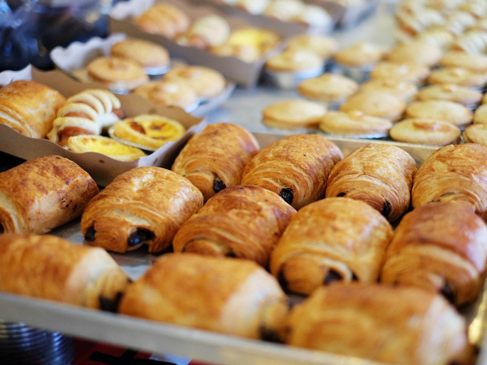 A tray of croissants and pain au chocolat