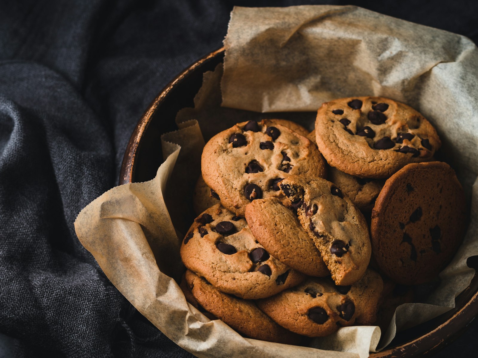 Chocolate chip cookies in a paper-lined basket